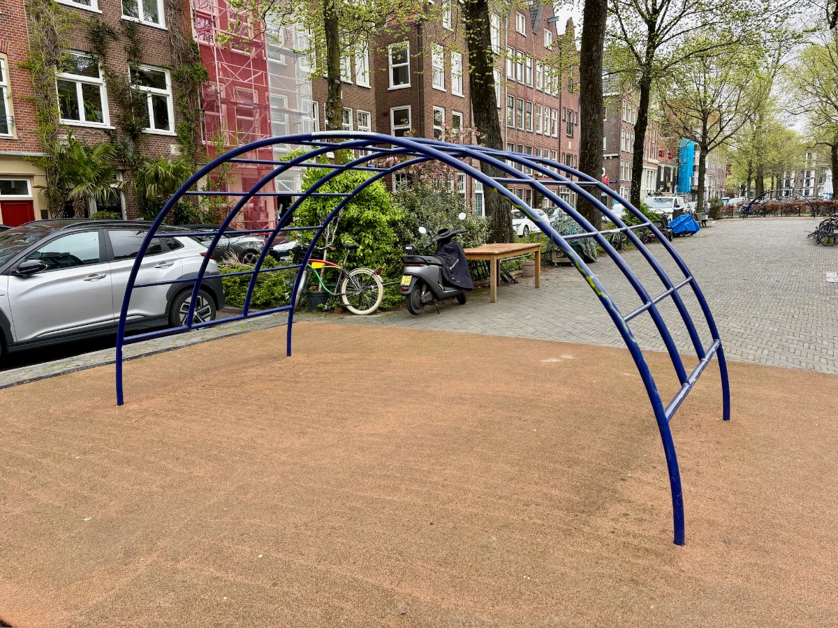 Blue arch climbing frame on playground