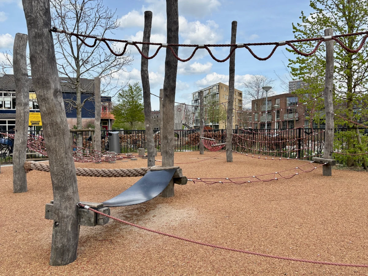Rope obstacle course on brown rubberized surface